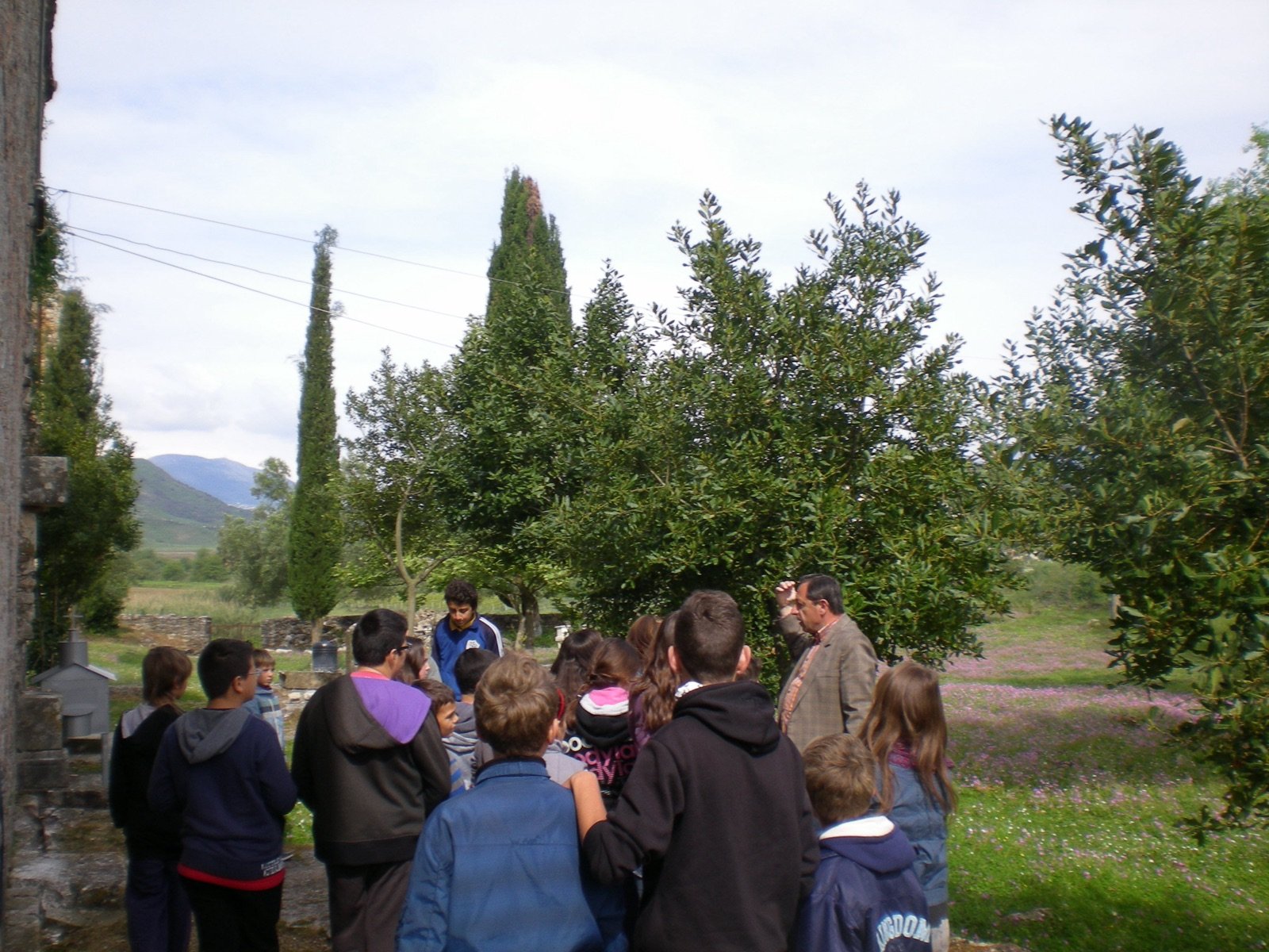 Guiding schoolchildren on a visit to a historic site